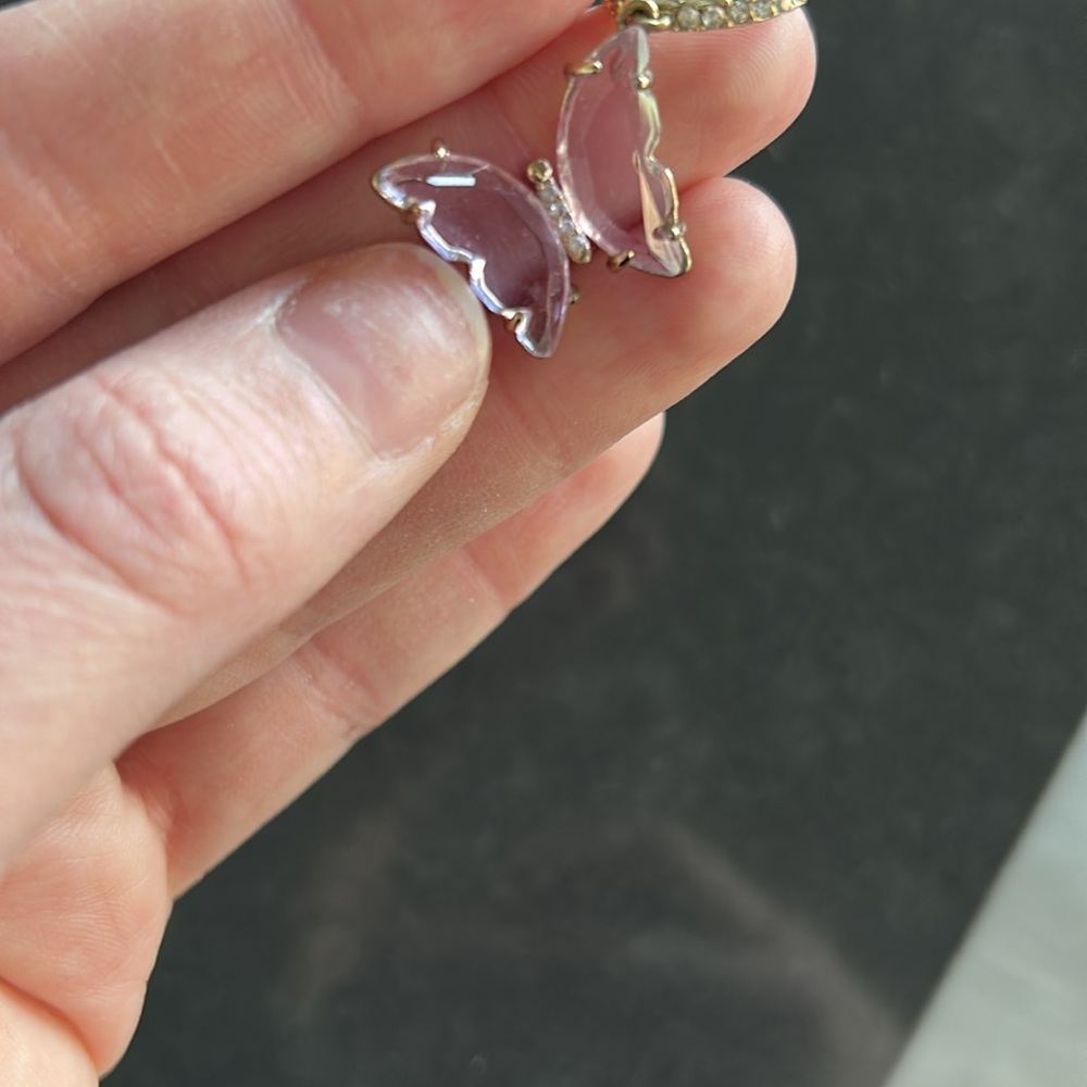 Purple crystal wing butterfly earrings in gold tone with rhinestones - Picture 3 of 3